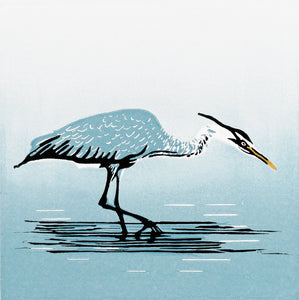 Lino print of heron in blue grey and black ink