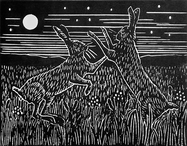 Boxing hares linocut in black ink