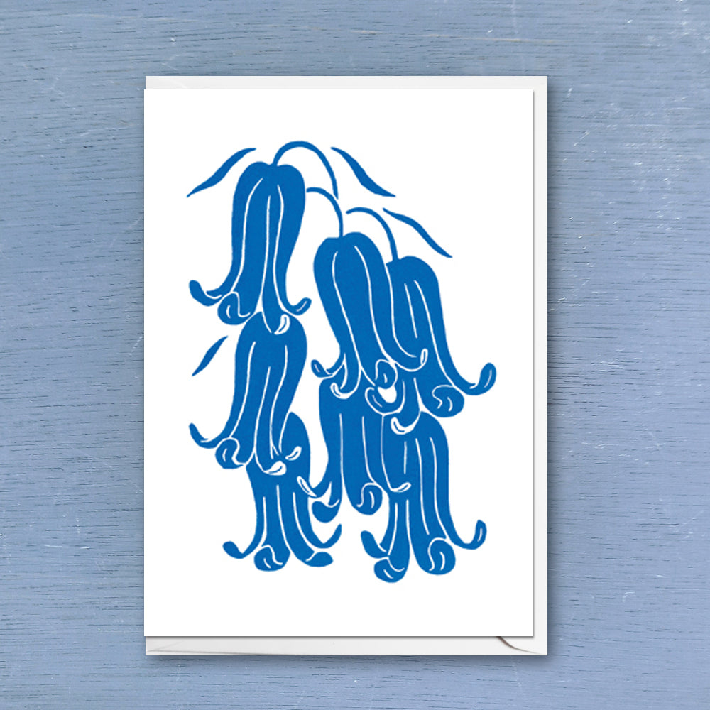 Linocut greeting card of bluebell flowers printed with bright indigo colour ink with envelope 