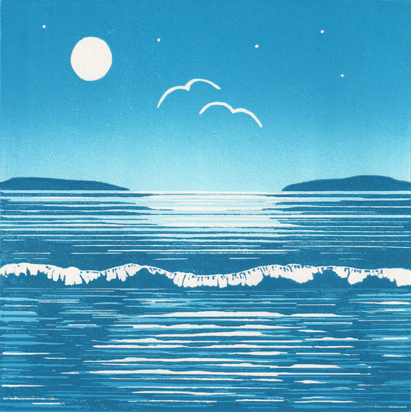 Lino print of two white birds above blue sea and moonlit sky