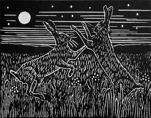 Lino print of boxing hares in black ink