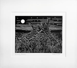 Boxing Hares linocut in black ink with mount