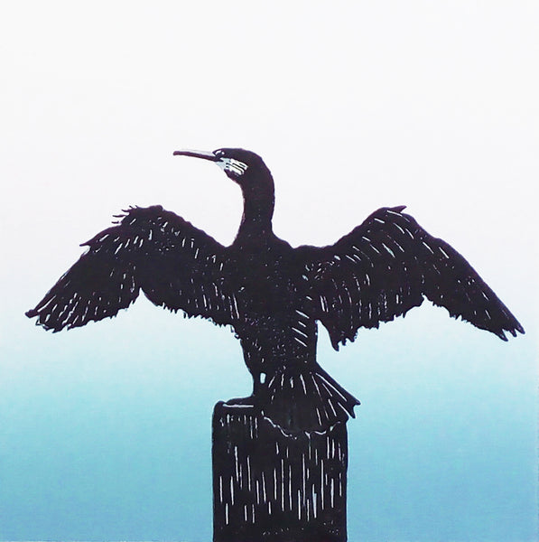 Linocut printed with black, blue and pink ink of cormorant drying its spread wings