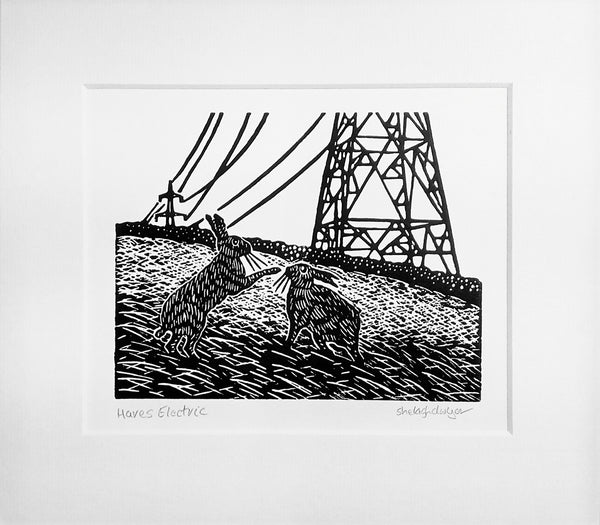 Playful hares and electric pylons linocut in black ink  with mount