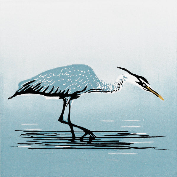 Lino print of heron poised in a river