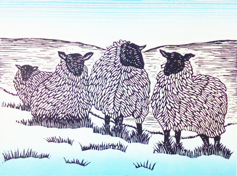 Lino print of woolly sheep on a hillside